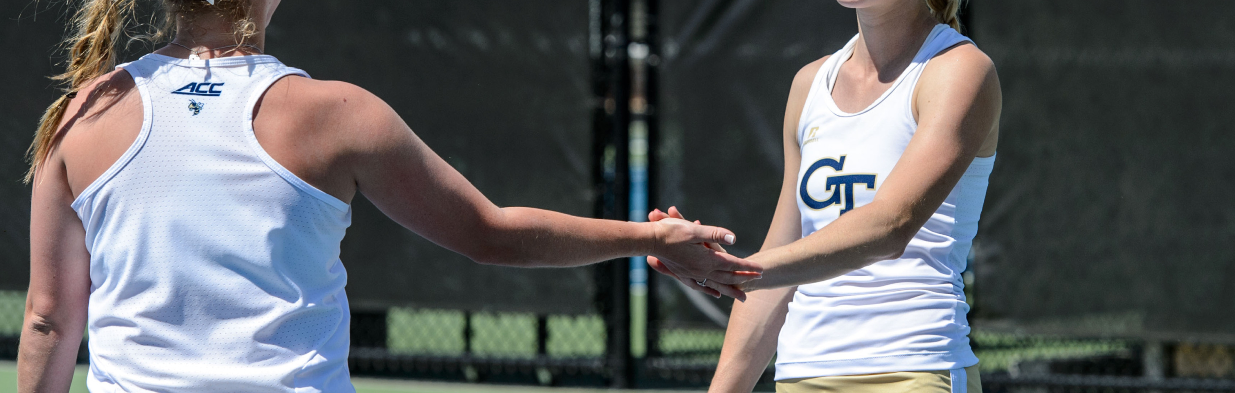 Tennis players high fiving