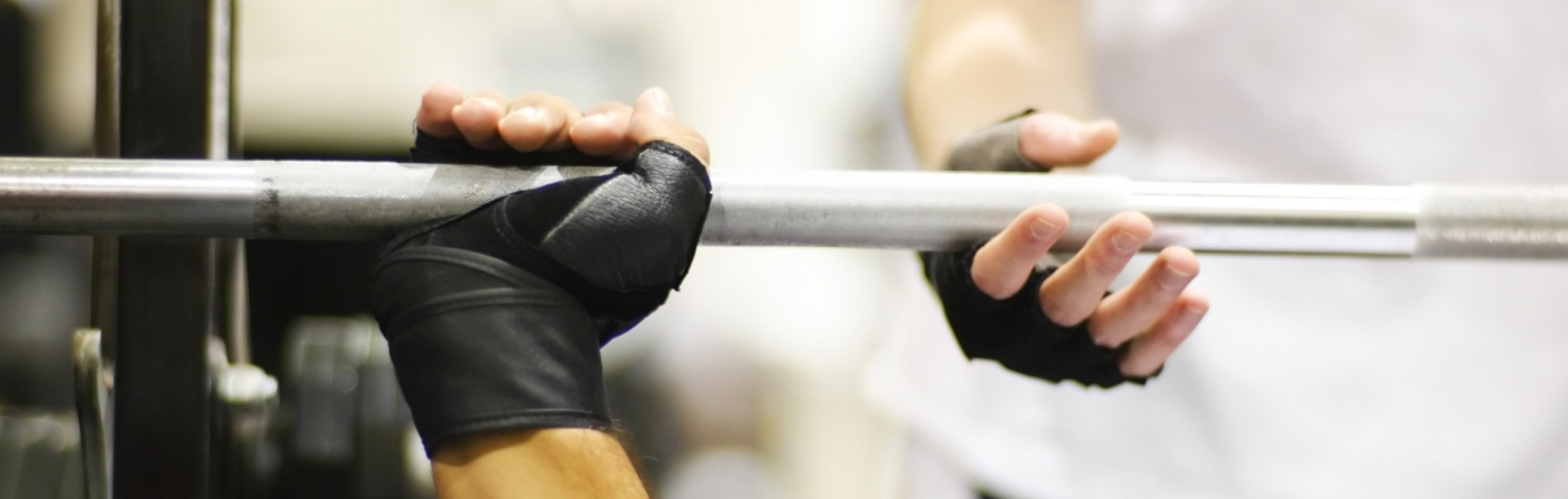 Hands lifting weights.