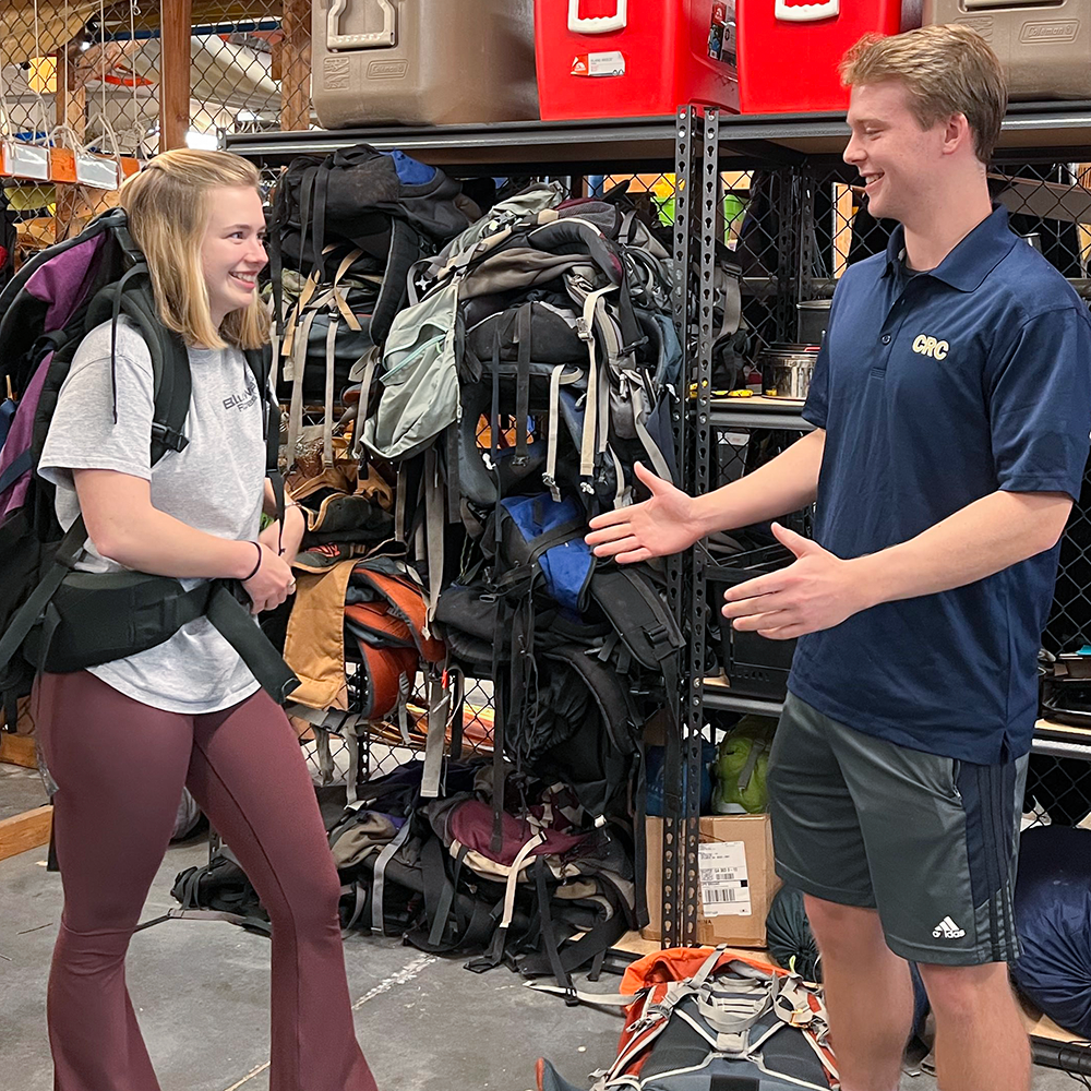 A Wilderness Outpost staff talking with a client.