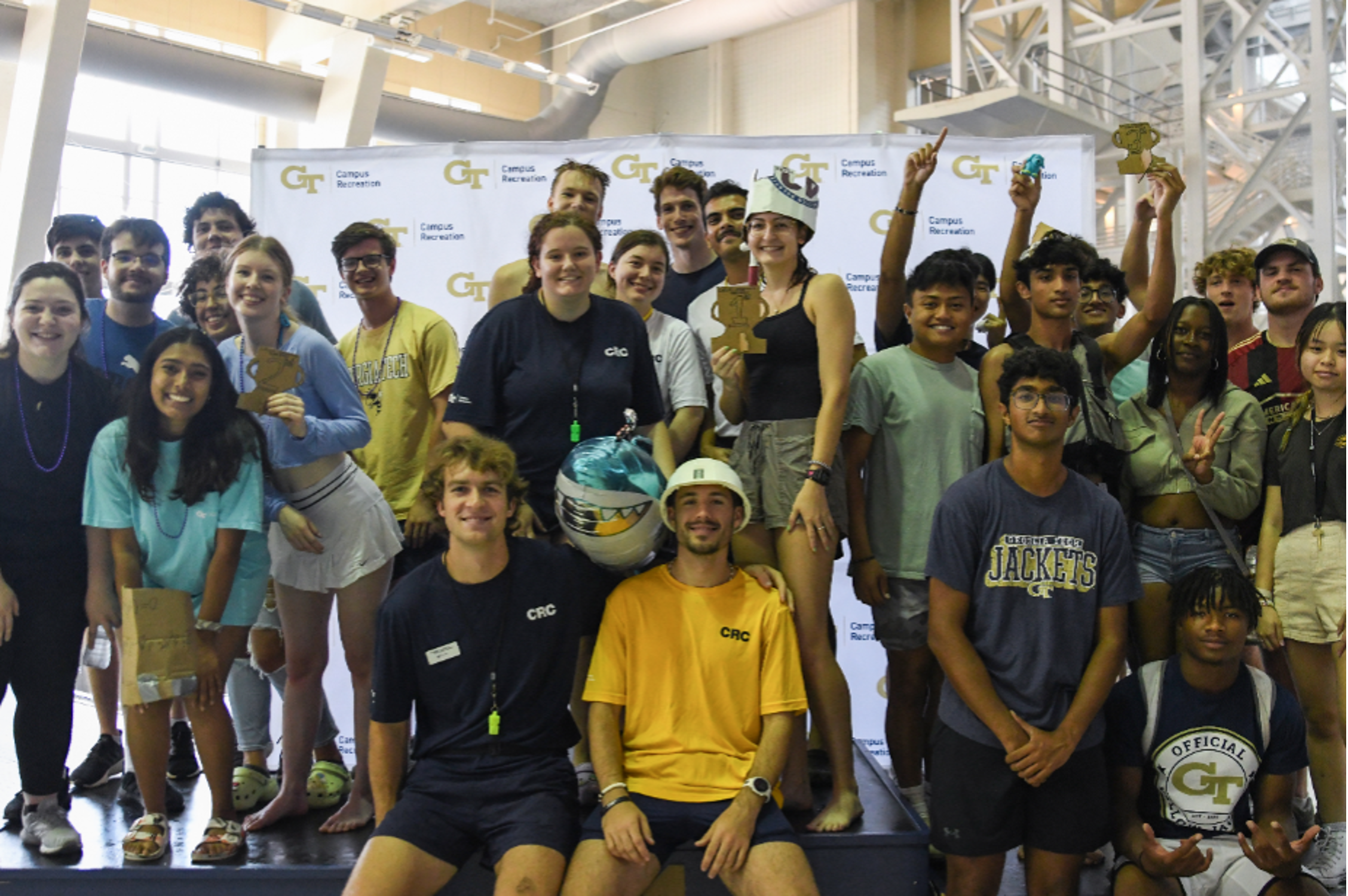 top three finishers of the first annual cardboard boat race