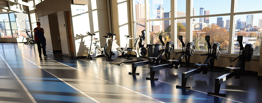 Indoor track with a view of the Atlanta downtown skyline.