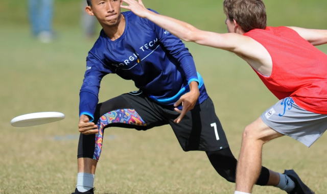 Playing frisbee.